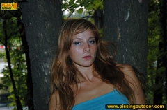 Outdoor pissing in the night of teen redhead girl - N