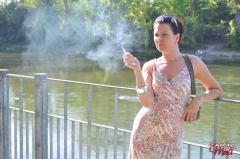 Brunette babe smoking at the riverside - N