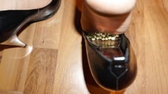 Foot torture with peas in high heels, leggings and corset - N