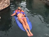 Busty MILF in tiny bikini masturbates underwater
