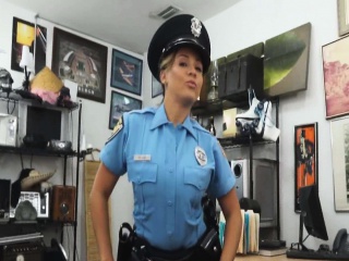 Real cop moonlights as ho for pawn shop