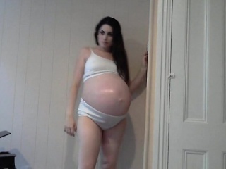 Pregnant in panties that are white