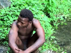 Brown soldier strips naked by the stream